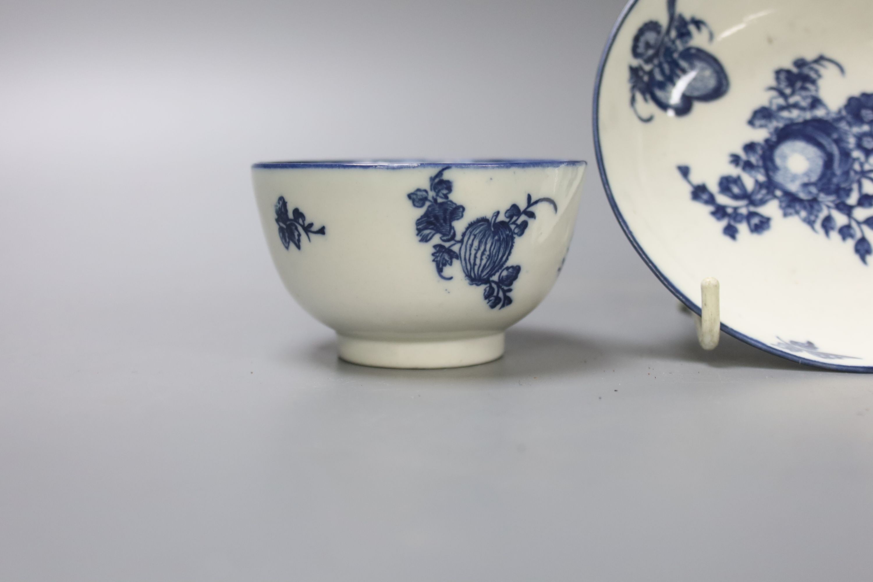 A Worcester blue and white tea bowl and saucer, c.1780, 12.5cm